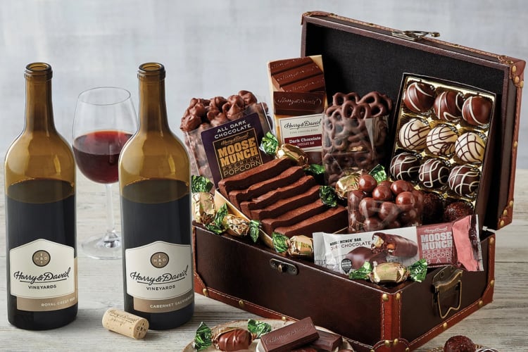 Two bottles of wine, a box and chocolates