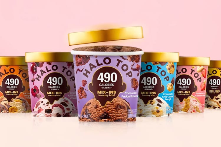 Tubs of Halo Top ice cream on a pink background