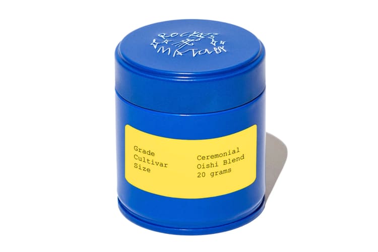 A blue tin with a yellow label