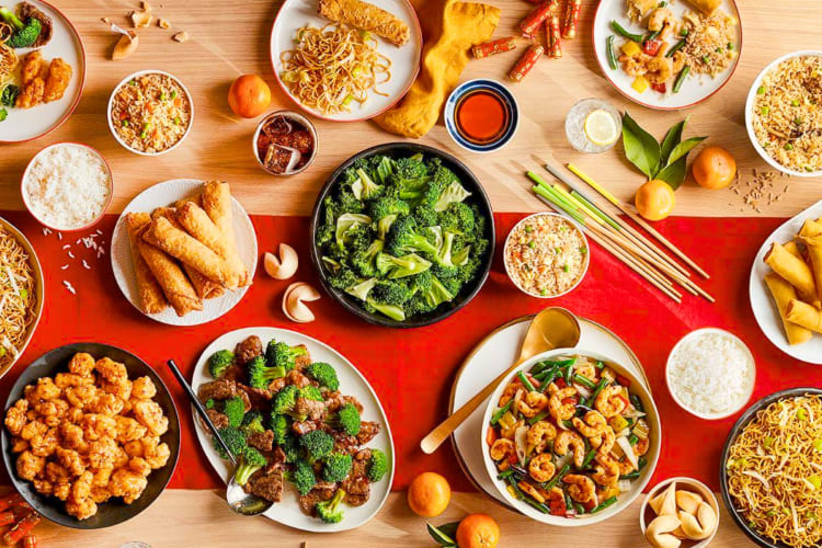 A selection of the best entrées at Panda Express on a table