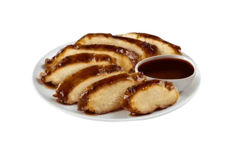 A plate of grilled teriyaki chicken