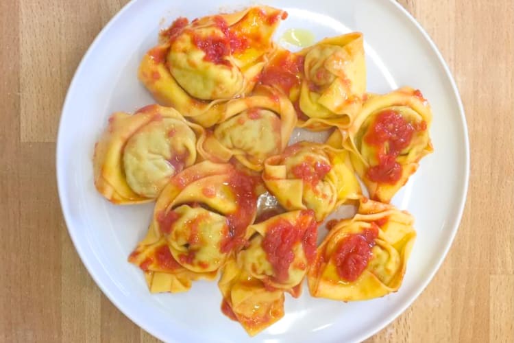 Stuffed pasta in tomato sauce on a plate