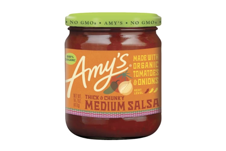 A glass jar of Amy’s Thick and Chunky Salsa Medium