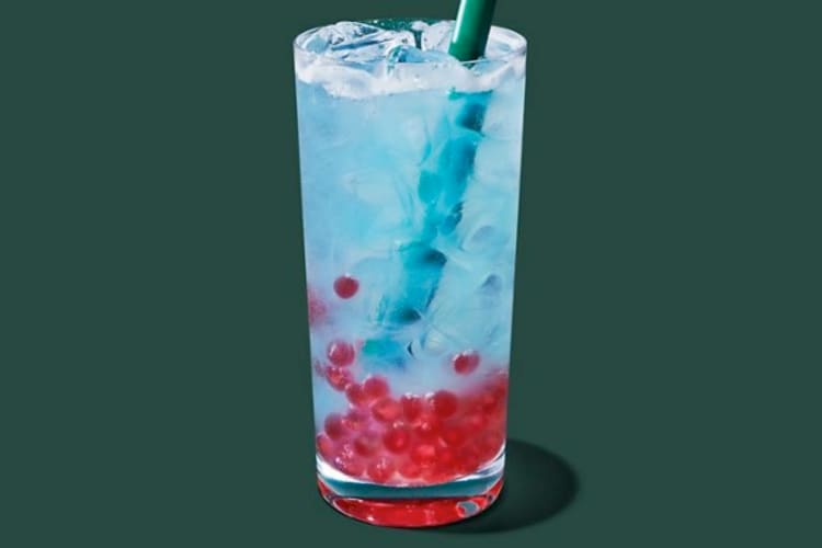 A blue drink with boba