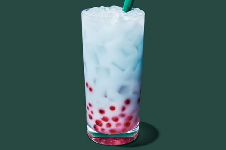 A blue drink with red boba