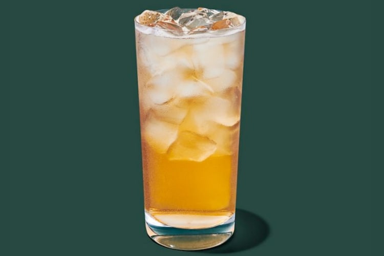 A glass of peach iced tea