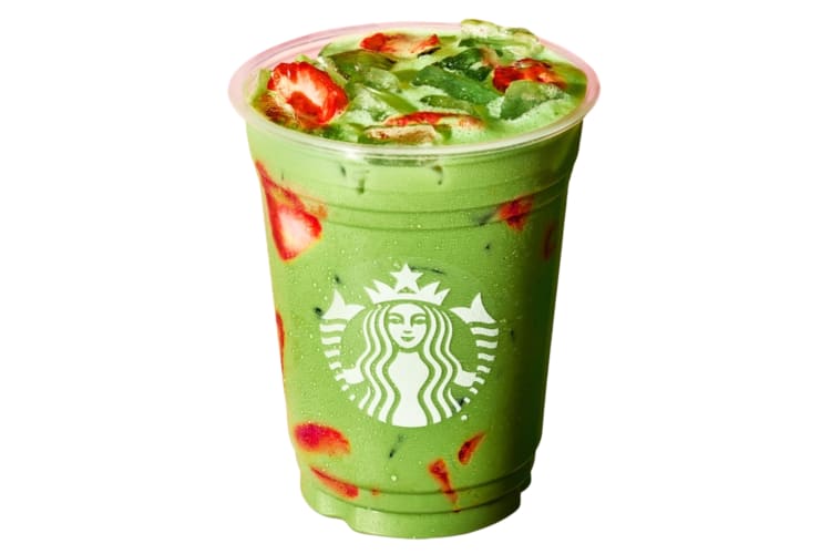 A Starbucks iced matcha drink with strawberries