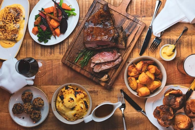 Beautifully roasted beef with all the classic Sunday roast side dishes.