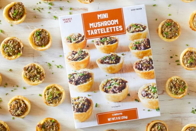 Mini mushroom tarts surrounding the box they came in