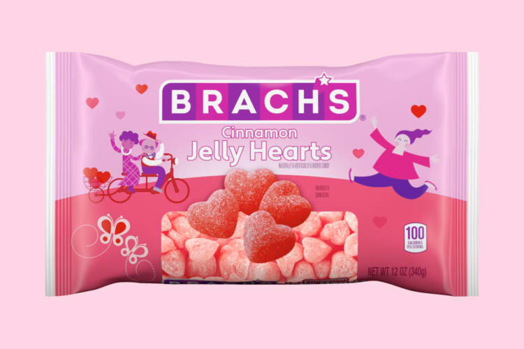 A pink and purple bag of heart-shaped candy