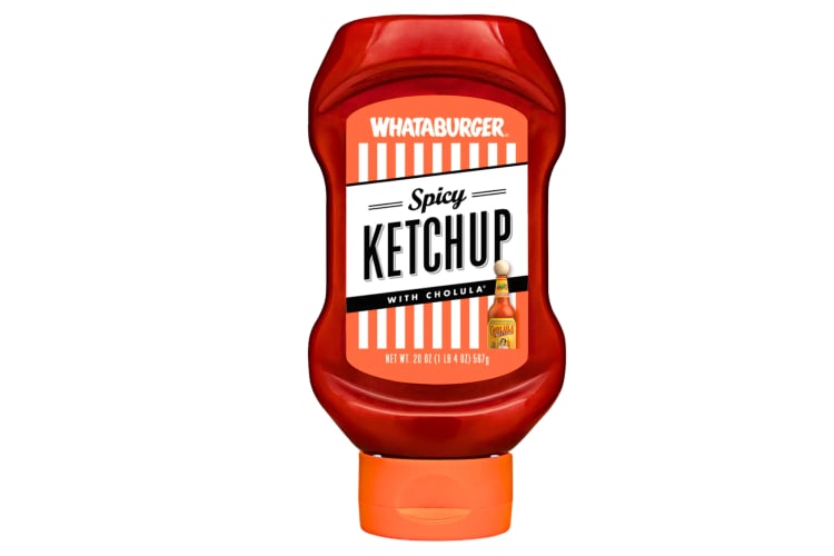 A container of Whataburger Spicy Ketchup with Cholula