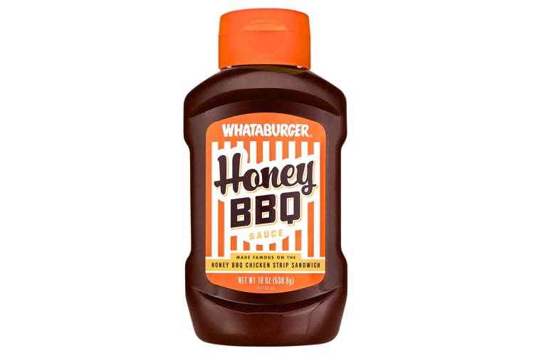 A container of Whataburger Honey BBQ sauce