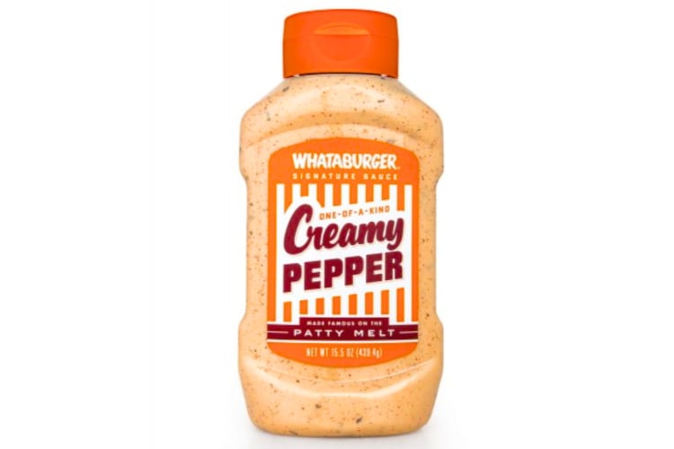 A container of Creamy Pepper Sauce by Whataburger 