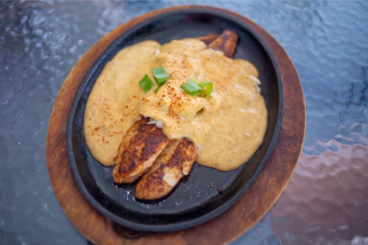 A plate of Cajun seafood is shown at Willie's Restaurant