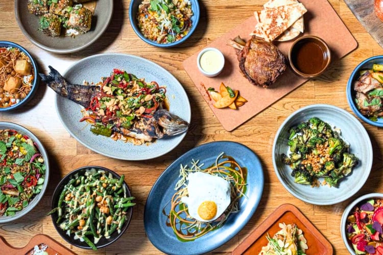 A variety of dishes laid out on a table