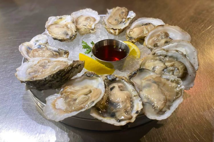 Oysters on a plate with lemon