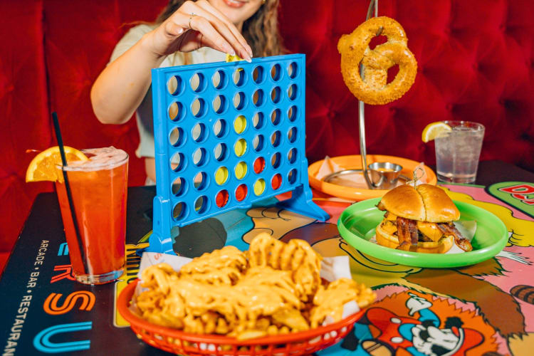 Playing games at Versus is a laid-back birthday idea in Boston
