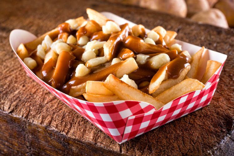 Poutine in a red and white chequered box