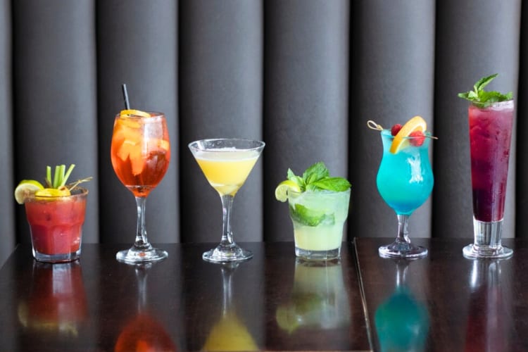 Six colourful cocktails in a row