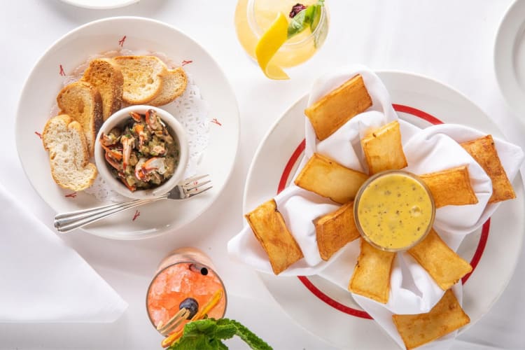 Restaurant dishes and cocktails on a table