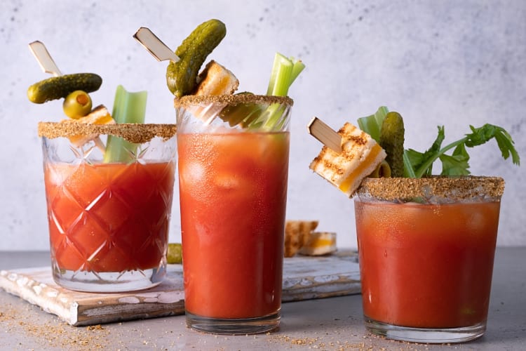 Eye-level view of three Bloody Mary vodka cocktails