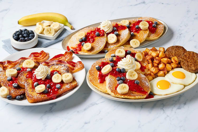 Variety of meals with French toast, pancakes, eggs patties and fruit, from Bob Evans