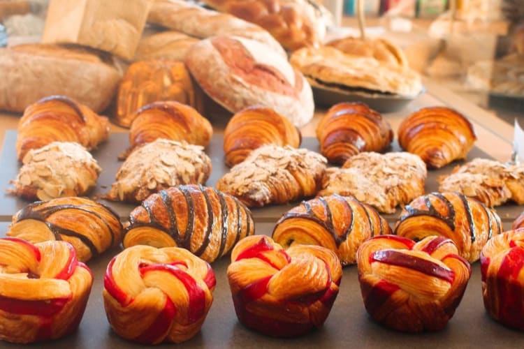 A variety of pastries including pain au chocolat, almond croissants and plain croissants