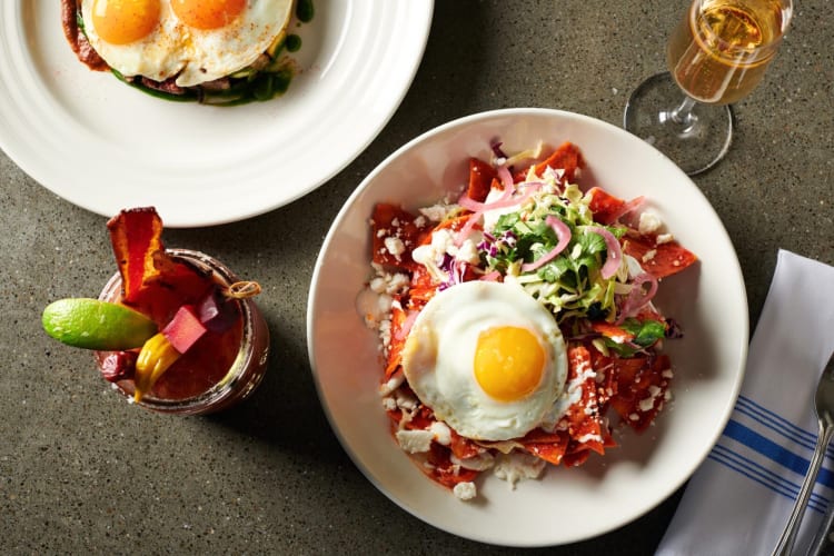 Breakfast dishes and Champagne glasses on a table