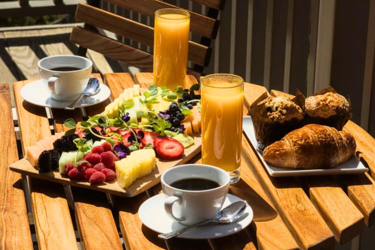 Breakfast dishes on a table outside