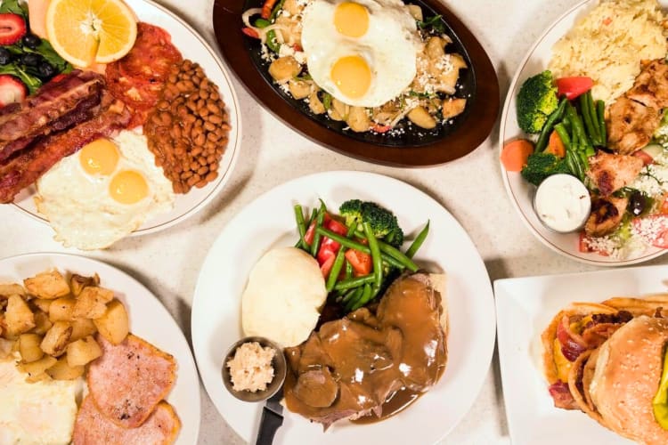 Aerial view of breakfast and lunch dishes on a table