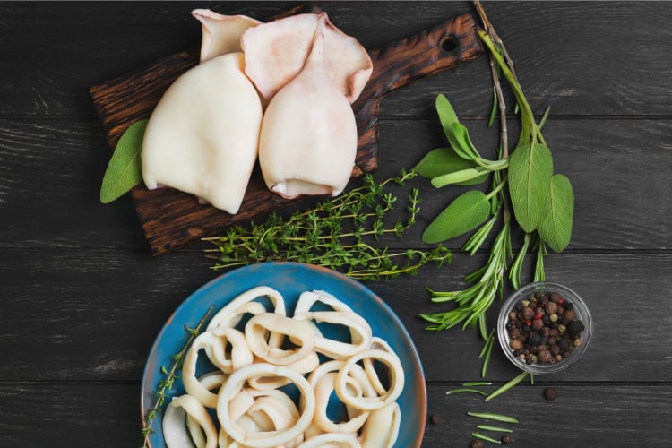 Raw squid with fresh ingredients.