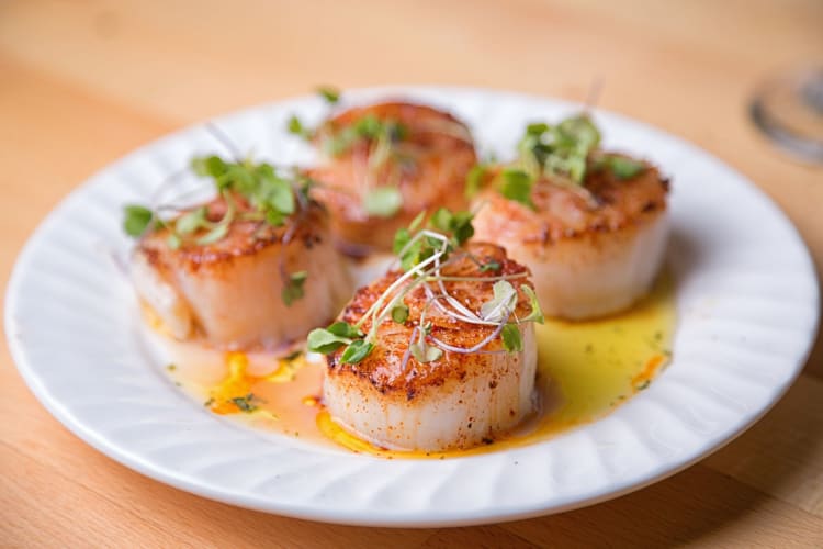 Head to Calgary restaurant, Alloy, for delicious fare including Digby scallops.