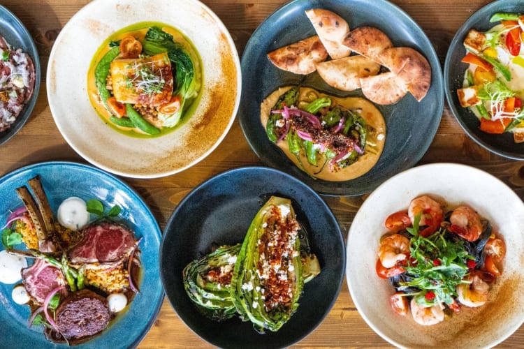 Various plates of delicious food at Orchard Restaurant.