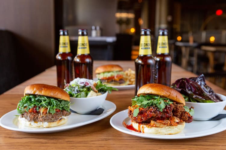 Delicious burgers and bottles of beer at The Guild.