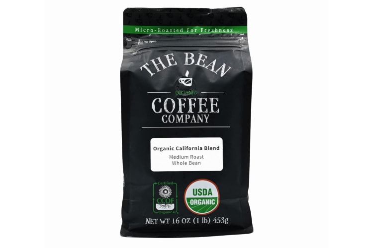 A black bag of coffee with a The Bean Organic Coffee Company label