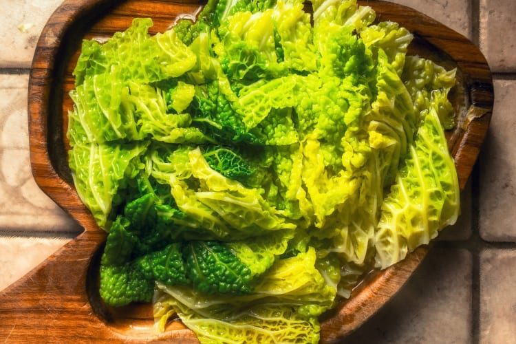 Cooked cabbage on a wooden dish