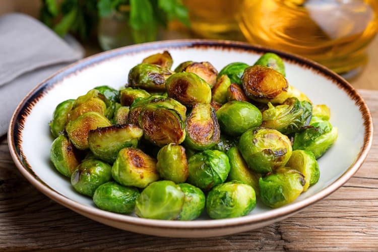 Cooked Brussels sprouts in a bowl