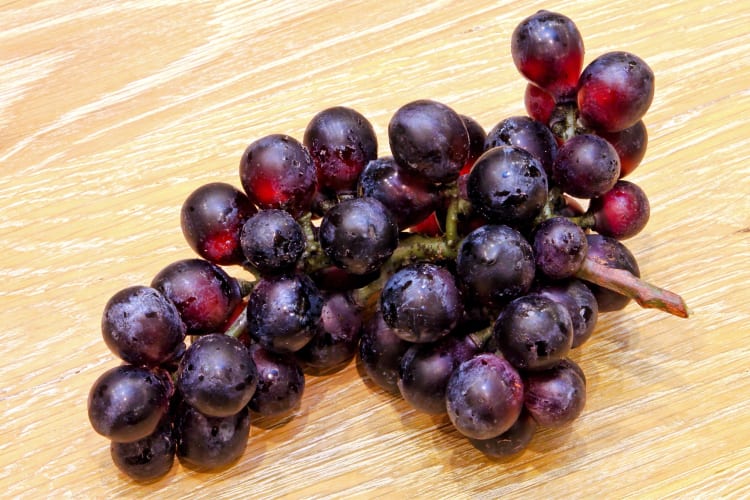 A bunch of red grapes