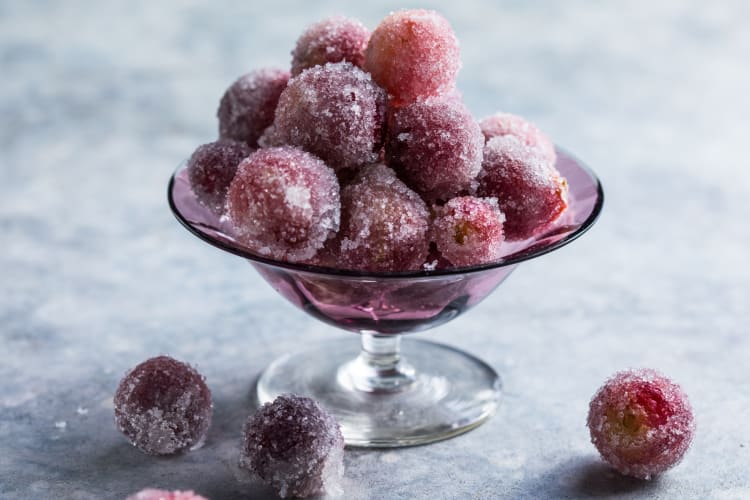 Frozen grapes in a glass