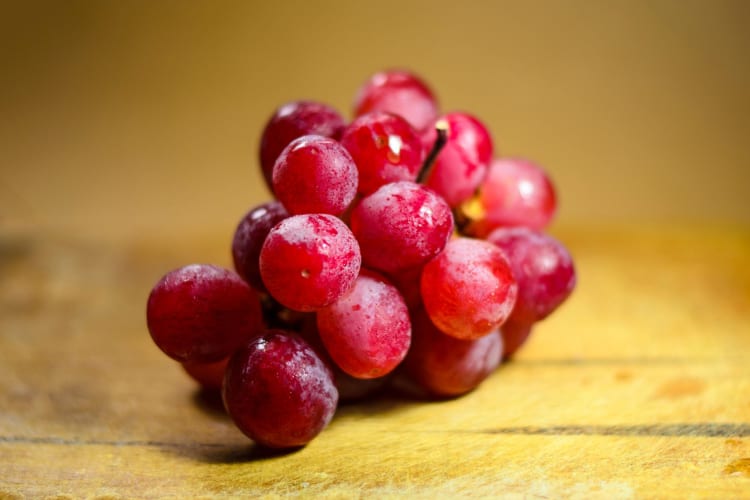A bunch of red grapes