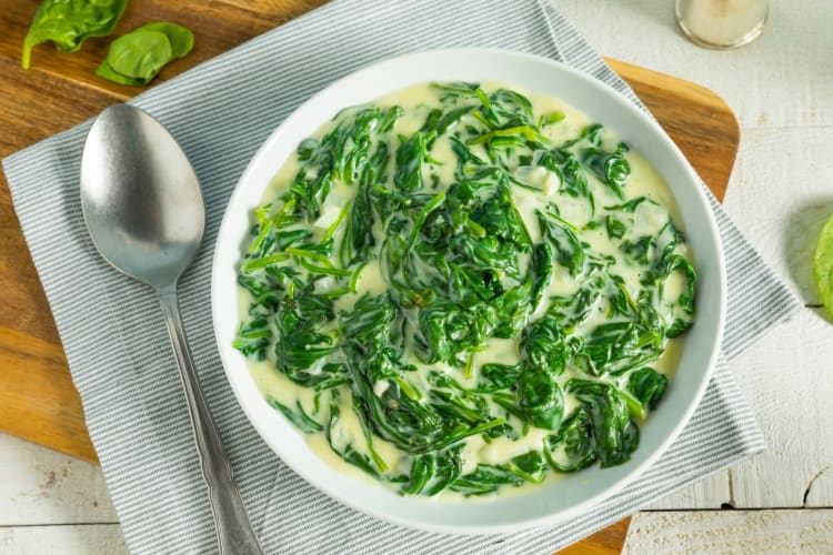 A bowl of creamed spinach