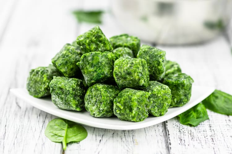 Frozen spinach in a bowl