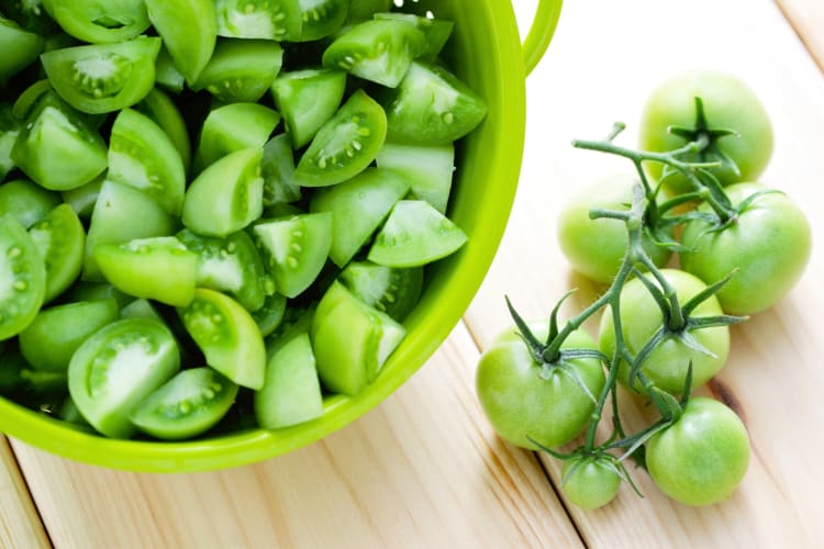 Whole and chopped green toamtoes