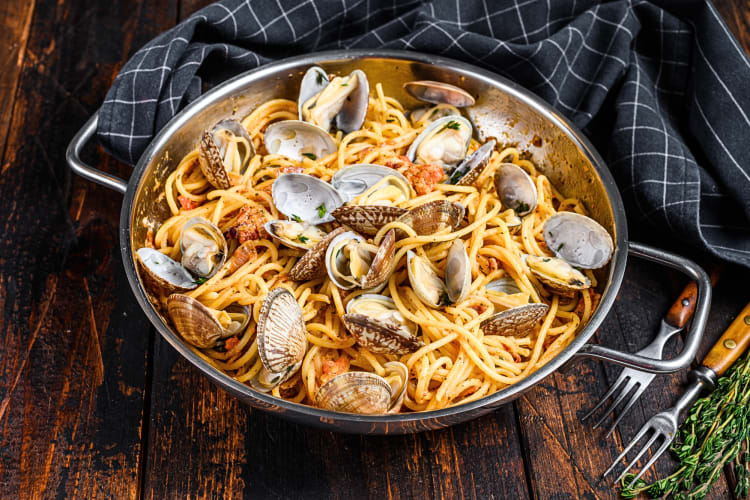 Clams vongole seafood pasta in a pot
