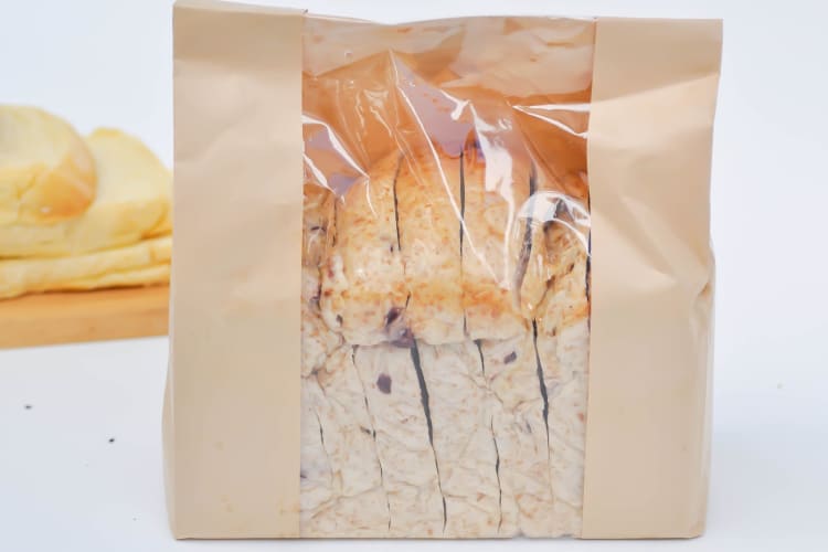 Before freezing, it's best to remove bread from its original packaging, wrap it in plastic wrap and then foil or a heavy duty freezer bag.