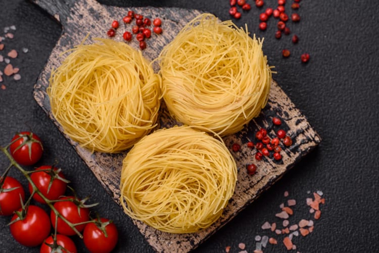 dried capellini on a board