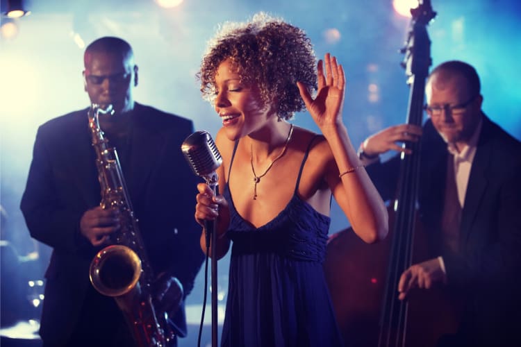 A woman singing with a jazz band 