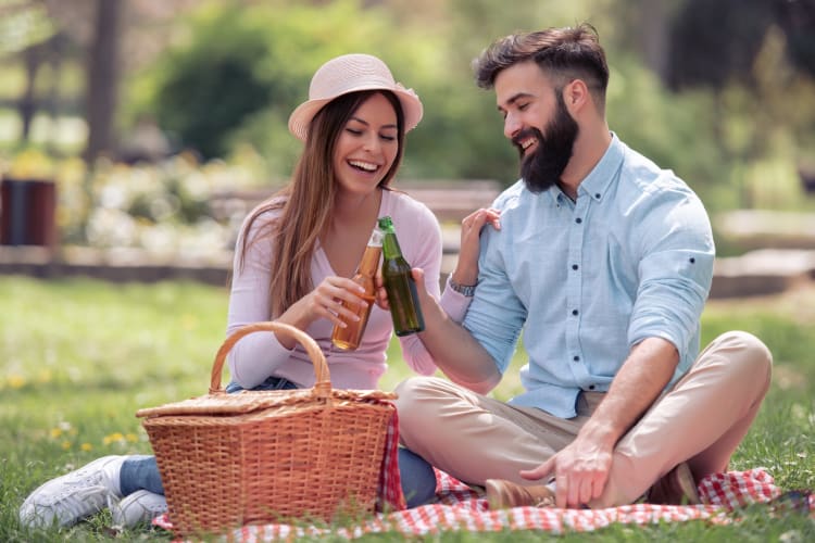 A couple having a picnic in the park