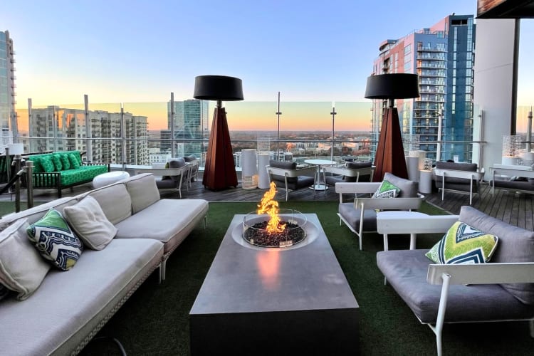 A rooftop bar at sunset