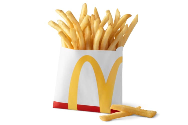 A small fries in a paper bag from McDonald's